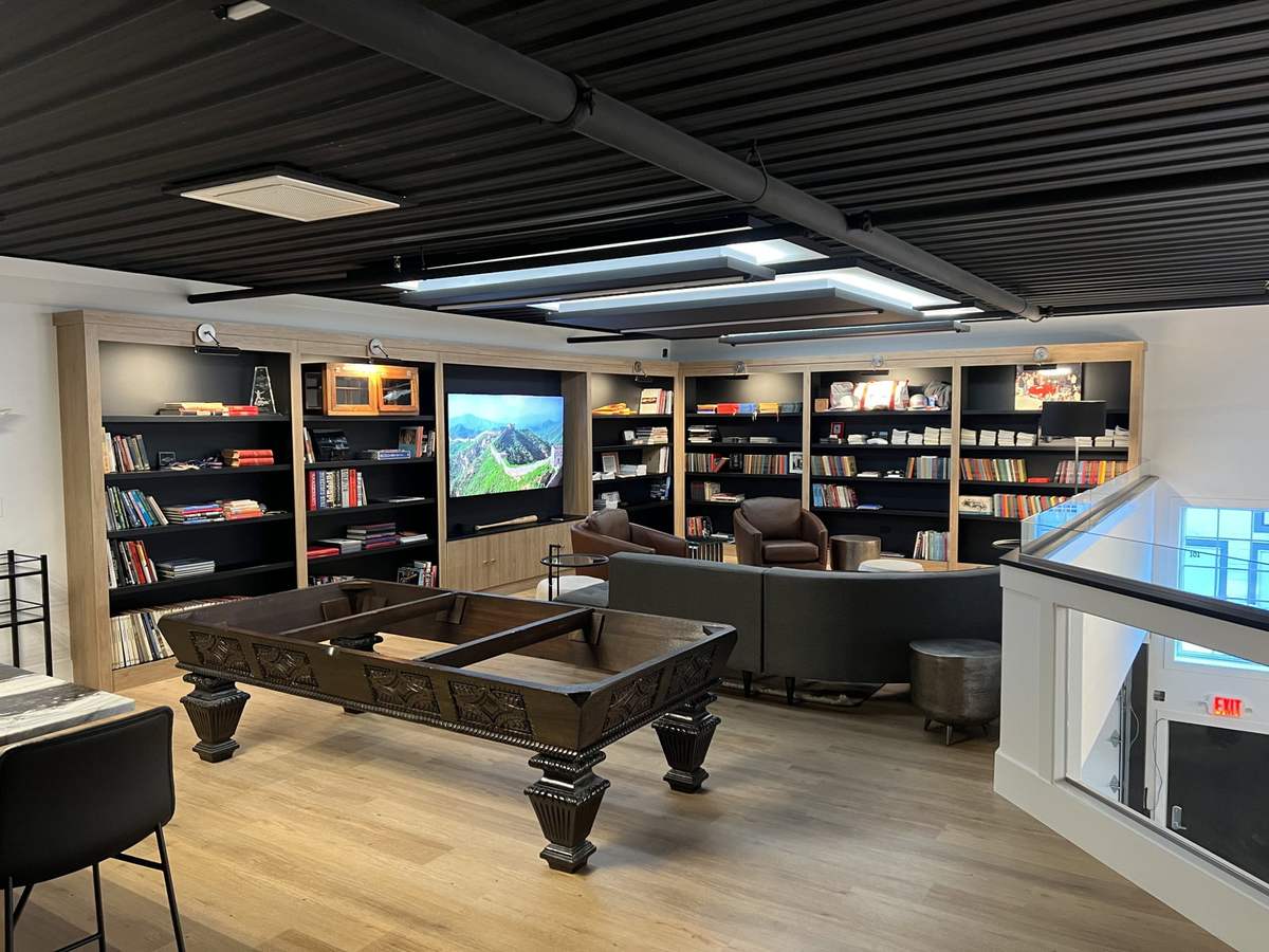Recreation room with pool table and display shelves