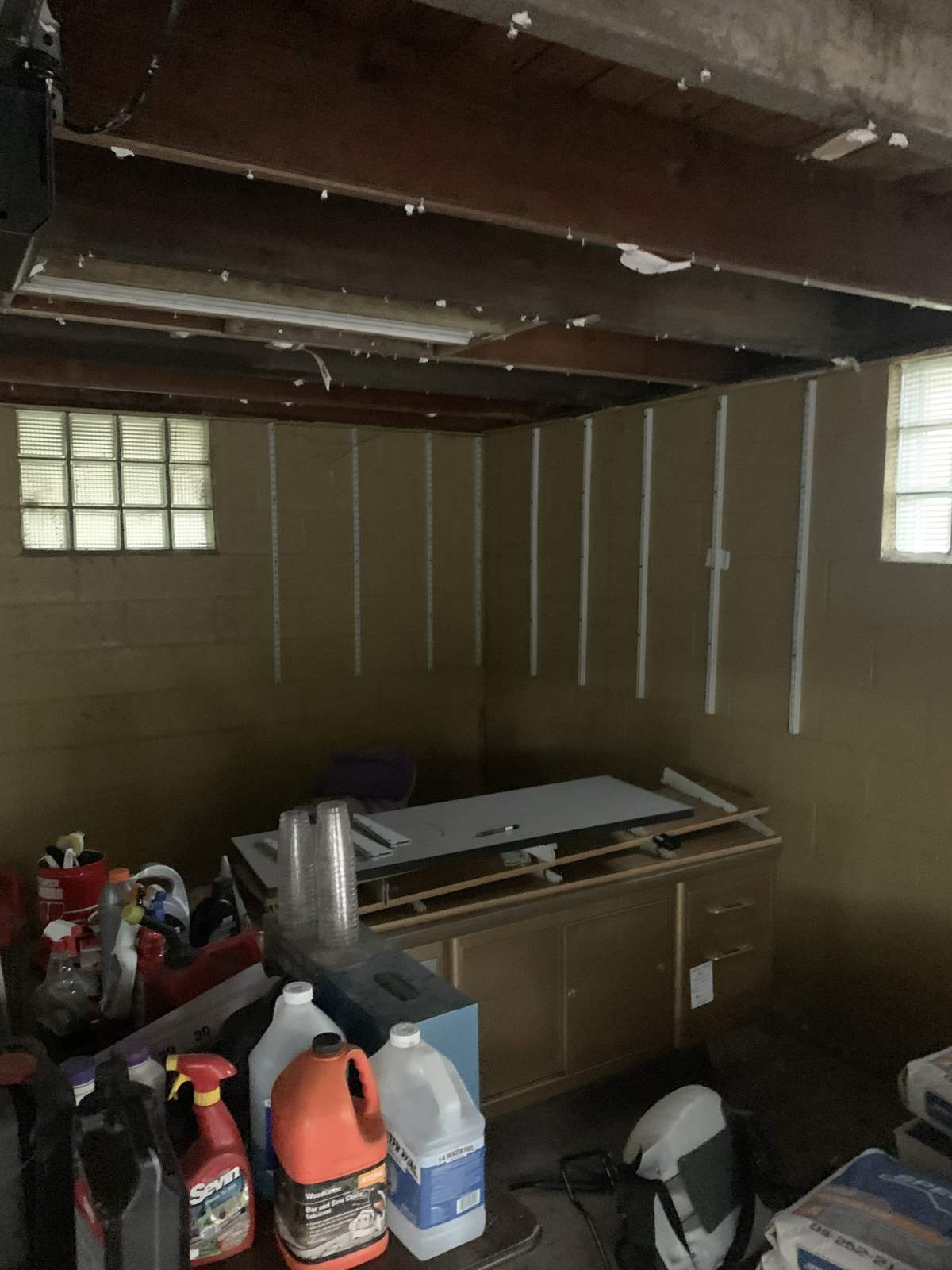 Unfinished interior with exposed ceiling framing