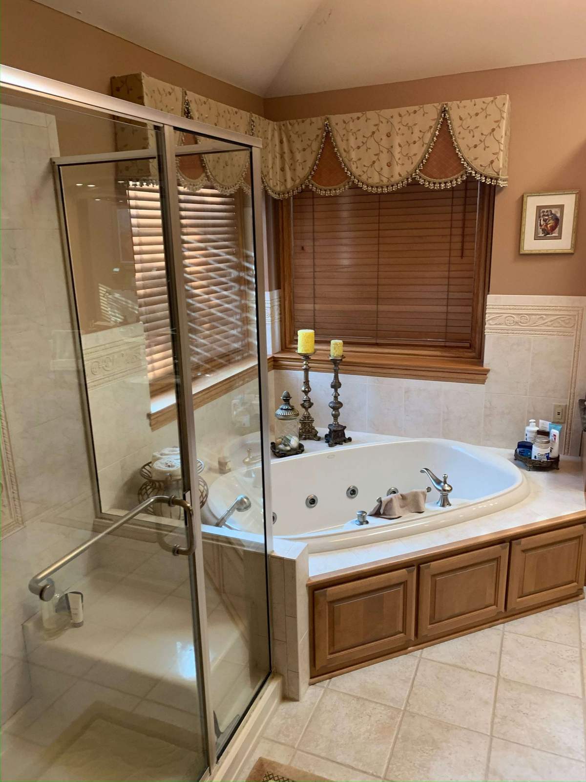 Bathroom before remodeling with built-in corner tub